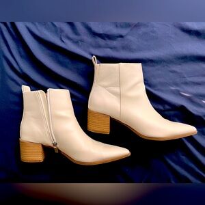 Cream colored ankle boots. Pointed toe. Size 8